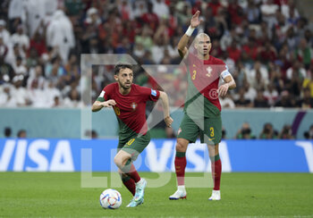 2022-12-06 - Bernardo Silva, Pepe of Portugal during the FIFA World Cup 2022, Round of 16 football match between Portugal and Switzerland on December 6, 2022 at Lusail Stadium in Al Daayen, Qatar - FOOTBALL - WORLD CUP 2022 - 1/8 - PORTUGAL V SWITZERLAND - FIFA WORLD CUP - SOCCER