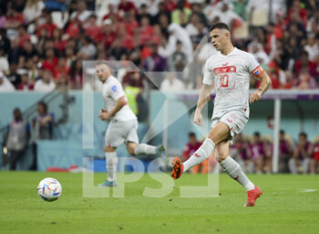 2022-12-06 - Granit Xhaka of Switzerland during the FIFA World Cup 2022, Round of 16 football match between Portugal and Switzerland on December 6, 2022 at Lusail Stadium in Al Daayen, Qatar - FOOTBALL - WORLD CUP 2022 - 1/8 - PORTUGAL V SWITZERLAND - FIFA WORLD CUP - SOCCER