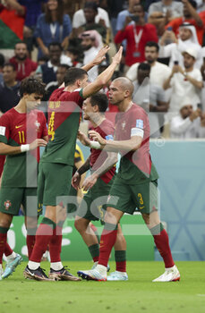 2022-12-06 - Pepe of Portugal celebrates his goal with Ruben Dias (left) during the FIFA World Cup 2022, Round of 16 football match between Portugal and Switzerland on December 6, 2022 at Lusail Stadium in Al Daayen, Qatar - FOOTBALL - WORLD CUP 2022 - 1/8 - PORTUGAL V SWITZERLAND - FIFA WORLD CUP - SOCCER