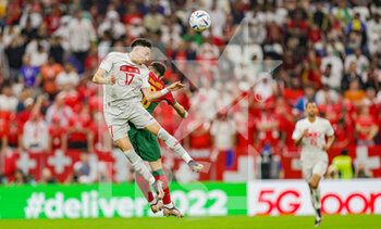 2022-12-06 - Ruben Vargas (17) of Switzerland and Bruno Fernandes (8) of Portugal during the FIFA World Cup 2022, Round of 16 football match between Portugal and Switzerland on December 6, 2022 at Lusail Stadium in Al Daayen, Qatar - FOOTBALL - WORLD CUP 2022 - 1/8 - PORTUGAL V SWITZERLAND - FIFA WORLD CUP - SOCCER