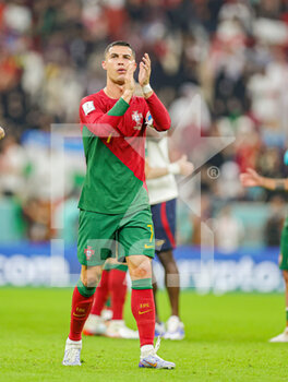 2022-12-06 - Cristiano Ronaldo (7) of Portugal thanks fans at full time during the FIFA World Cup 2022, Round of 16 football match between Portugal and Switzerland on December 6, 2022 at Lusail Stadium in Al Daayen, Qatar - FOOTBALL - WORLD CUP 2022 - 1/8 - PORTUGAL V SWITZERLAND - FIFA WORLD CUP - SOCCER