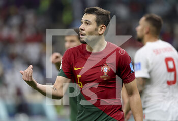 2022-12-06 - Raphael Guerreiro of Portugal during the FIFA World Cup 2022, Round of 16 football match between Portugal and Switzerland on December 6, 2022 at Lusail Stadium in Al Daayen, Qatar - FOOTBALL - WORLD CUP 2022 - 1/8 - PORTUGAL V SWITZERLAND - FIFA WORLD CUP - SOCCER
