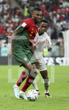 2022-12-06 - Rafael Leao of Portugal, Edimilson Fernandes of Switzerland during the FIFA World Cup 2022, Round of 16 football match between Portugal and Switzerland on December 6, 2022 at Lusail Stadium in Al Daayen, Qatar - FOOTBALL - WORLD CUP 2022 - 1/8 - PORTUGAL V SWITZERLAND - FIFA WORLD CUP - SOCCER