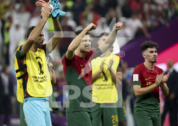 2022-12-06 - Diogo Dalot of Portugal and teammates celebrate the victory following the FIFA World Cup 2022, Round of 16 football match between Portugal and Switzerland on December 6, 2022 at Lusail Stadium in Al Daayen, Qatar - FOOTBALL - WORLD CUP 2022 - 1/8 - PORTUGAL V SWITZERLAND - FIFA WORLD CUP - SOCCER