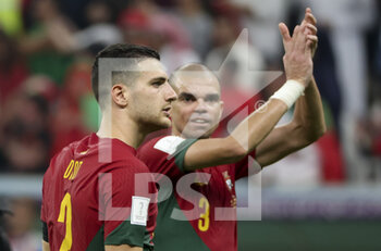 2022-12-06 - Diogo Dalot, Pepe of Portugal celebrate the victory following the FIFA World Cup 2022, Round of 16 football match between Portugal and Switzerland on December 6, 2022 at Lusail Stadium in Al Daayen, Qatar - FOOTBALL - WORLD CUP 2022 - 1/8 - PORTUGAL V SWITZERLAND - FIFA WORLD CUP - SOCCER