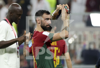 2022-12-06 - Bruno Fernandes of Portugal celebrates the victory following the FIFA World Cup 2022, Round of 16 football match between Portugal and Switzerland on December 6, 2022 at Lusail Stadium in Al Daayen, Qatar - FOOTBALL - WORLD CUP 2022 - 1/8 - PORTUGAL V SWITZERLAND - FIFA WORLD CUP - SOCCER