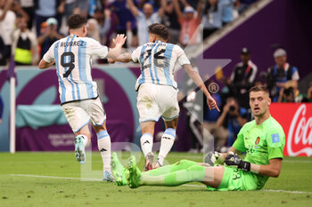 2022-12-09 - Nahuel Molina of Argentina celebrates with teammates after scoring the team's first goal during the FIFA World Cup 2022, Quarter-final football match between Netherlands and Argentina on December 9, 2022 at Lusail Stadium in Al Daayen, Qatar - FOOTBALL - WORLD CUP 2022 - 1/4 - NETHERLANDS V ARGENTINA - FIFA WORLD CUP - SOCCER