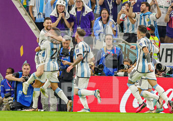 2022-12-10 - Nahuel Molina (26) of Argentina scores a goal and celebrates 0-1 during the FIFA World Cup 2022, Quarter-final football match between Netherlands and Argentina on December 9, 2022 at Lusail Stadium in Al Daayen, Qatar - FOOTBALL - WORLD CUP 2022 - 1/4 - NETHERLANDS V ARGENTINA - FIFA WORLD CUP - SOCCER