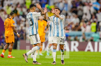 2022-12-10 - Nahuel Molina (26) of Argentina scores a goal and celebrates 0-1 during the FIFA World Cup 2022, Quarter-final football match between Netherlands and Argentina on December 9, 2022 at Lusail Stadium in Al Daayen, Qatar - FOOTBALL - WORLD CUP 2022 - 1/4 - NETHERLANDS V ARGENTINA - FIFA WORLD CUP - SOCCER