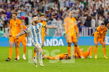 2022-12-10 - Lionel Messi (10) of Argentina celebrates the teams win on penalties during the FIFA World Cup 2022, Quarter-final football match between Netherlands and Argentina on December 9, 2022 at Lusail Stadium in Al Daayen, Qatar - FOOTBALL - WORLD CUP 2022 - 1/4 - NETHERLANDS V ARGENTINA - FIFA WORLD CUP - SOCCER