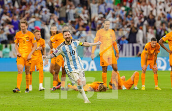 2022-12-10 - Lionel Messi (10) of Argentina celebrates the teams win on penalties during the FIFA World Cup 2022, Quarter-final football match between Netherlands and Argentina on December 9, 2022 at Lusail Stadium in Al Daayen, Qatar - FOOTBALL - WORLD CUP 2022 - 1/4 - NETHERLANDS V ARGENTINA - FIFA WORLD CUP - SOCCER