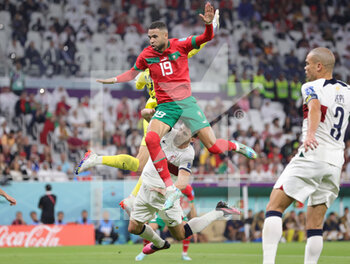 2022-12-10 - Youssef En-Nesyri of Morocco scores a goal 1-0 during the FIFA World Cup 2022, Quarter-final football match between Morocco and Portugal on December 10, 2022 at Al Thumama Stadium in Doha, Qatar - FOOTBALL - WORLD CUP 2022 - 1/4 - MOROCCO V PORTUGAL - FIFA WORLD CUP - SOCCER
