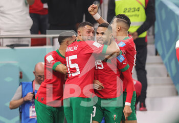 2022-12-10 - Youssef En-Nesyri of Morocco celebrates his goal 1-0 with Selim Amallah during the FIFA World Cup 2022, Quarter-final football match between Morocco and Portugal on December 10, 2022 at Al Thumama Stadium in Doha, Qatar - FOOTBALL - WORLD CUP 2022 - 1/4 - MOROCCO V PORTUGAL - FIFA WORLD CUP - SOCCER