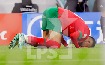 2022-12-10 - Youssef En-Nesyri of Morocco celebrates his goal 1-0 during the FIFA World Cup 2022, Quarter-final football match between Morocco and Portugal on December 10, 2022 at Al Thumama Stadium in Doha, Qatar - FOOTBALL - WORLD CUP 2022 - 1/4 - MOROCCO V PORTUGAL - FIFA WORLD CUP - SOCCER