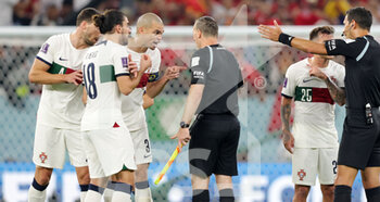 2022-12-10 - Ruben Dias, Ruben Neves, Pepe, Goncalo Ramos of Portugal argue with referee at half time during the FIFA World Cup 2022, Quarter-final football match between Morocco and Portugal on December 10, 2022 at Al Thumama Stadium in Doha, Qatar - FOOTBALL - WORLD CUP 2022 - 1/4 - MOROCCO V PORTUGAL - FIFA WORLD CUP - SOCCER
