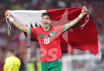 2022-12-10 - Jawad El Yamiq of Morocco celebrates at full time during the FIFA World Cup 2022, Quarter-final football match between Morocco and Portugal on December 10, 2022 at Al Thumama Stadium in Doha, Qatar - FOOTBALL - WORLD CUP 2022 - 1/4 - MOROCCO V PORTUGAL - FIFA WORLD CUP - SOCCER