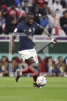 2022-12-10 - Dayot Upamecano of France during the FIFA World Cup 2022, Quarter-final football match between England and France on December 10, 2022 at Al Bayt Stadium in Al Khor, Qatar - FOOTBALL - WORLD CUP 2022 - 1/4 - ENGLAND V FRANCE - FIFA WORLD CUP - SOCCER