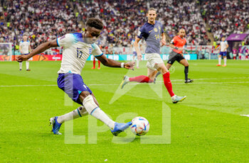 2022-12-10 - Bukayo Saka (17) of England during the FIFA World Cup 2022, Quarter-final football match between England and France on December 10, 2022 at Al Bayt Stadium in Al Khor, Qatar - FOOTBALL - WORLD CUP 2022 - 1/4 - ENGLAND V FRANCE - FIFA WORLD CUP - SOCCER