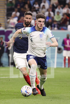 2022-12-10 - Declan Rice of England, Olivier Giroud of France during the FIFA World Cup 2022, Quarter-final football match between England and France on December 10, 2022 at Al Bayt Stadium in Al Khor, Qatar - FOOTBALL - WORLD CUP 2022 - 1/4 - ENGLAND V FRANCE - FIFA WORLD CUP - SOCCER