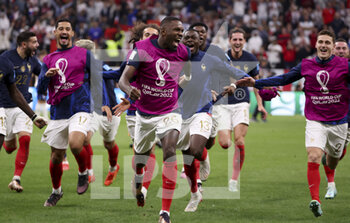 2022-12-10 - Marcus Thuram, Youssouf Fofana of France and teammates celebrate the victory following the FIFA World Cup 2022, Quarter-final football match between England and France on December 10, 2022 at Al Bayt Stadium in Al Khor, Qatar - FOOTBALL - WORLD CUP 2022 - 1/4 - ENGLAND V FRANCE - FIFA WORLD CUP - SOCCER