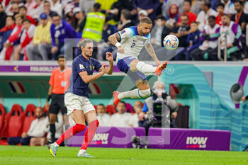 2022-12-11 - Kyle Walker (2) of England, Adrien Rabiot (14) of France during the FIFA World Cup 2022, Quarter-final football match between England and France on December 10, 2022 at Al Bayt Stadium in Al Khor, Qatar - FOOTBALL - WORLD CUP 2022 - 1/4 - ENGLAND V FRANCE - FIFA WORLD CUP - SOCCER