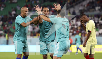 2022-12-12 - Houssine Kharja of Morocco, Cafu of Brazil celebrate during a football match gathering FIFA legends and workers who built the stadiums to benefit the charity 'Football unites the World' at Al Thumama Stadium during the FIFA World Cup 2022 on December 12, 2022 in Doha, Qatar - FOOTBALL - WORLD CUP 2022 - MISCS - FIFA WORLD CUP - SOCCER