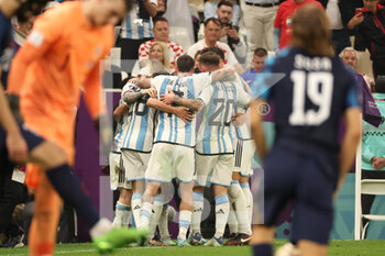 2022-12-13 - Julian Álvarez of Argentina celebrates his goal with team mates during the FIFA World Cup 2022, Semi-final football match between Argentina and Croatia on December 13, 2022 at Lusail Stadium in Al Daayen, Qatar - FOOTBALL - WORLD CUP 2022 - 1/2 - ARGENTINA V CROATIA - FIFA WORLD CUP - SOCCER