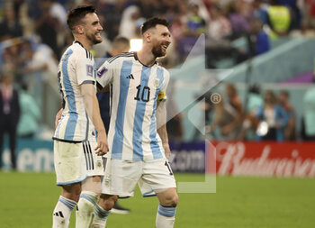 2022-12-13 - Lionel Messi, Nicolas Tagliafico (left) of Argentina celebrate the victory following the FIFA World Cup 2022, Semi-final football match between Argentina and Croatia on December 13, 2022 at Lusail Stadium in Al Daayen, Qatar - FOOTBALL - WORLD CUP 2022 - 1/2 - ARGENTINA V CROATIA - FIFA WORLD CUP - SOCCER