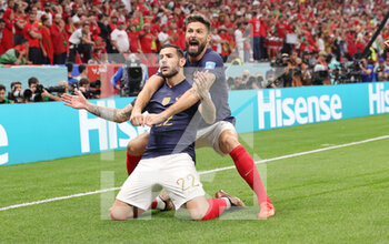 2022-12-14 - Theo Hernandez of France celebrates his goal 1-0 with Olivier Giroud during the FIFA World Cup 2022, Semi-final football match between France and Morocco on December 14, 2022 at Al Bayt Stadium in Al Khor, Qatar - FOOTBALL - WORLD CUP 2022 - 1/2 - FRANCE V MOROCCO - FIFA WORLD CUP - SOCCER