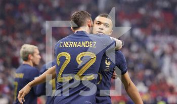 2022-12-14 - Theo Hernandez of France celebrates his goal 1-0 with Kylian Mbappe during the FIFA World Cup 2022, Semi-final football match between France and Morocco on December 14, 2022 at Al Bayt Stadium in Al Khor, Qatar - FOOTBALL - WORLD CUP 2022 - 1/2 - FRANCE V MOROCCO - FIFA WORLD CUP - SOCCER