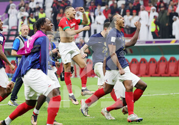 2022-12-14 - France players celebrate at full time during the FIFA World Cup 2022, Semi-final football match between France and Morocco on December 14, 2022 at Al Bayt Stadium in Al Khor, Qatar - FOOTBALL - WORLD CUP 2022 - 1/2 - FRANCE V MOROCCO - FIFA WORLD CUP - SOCCER