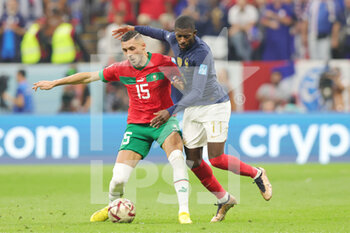 2022-12-14 - Selim Amallah of Morocco and Ousmane Dembele of France during the FIFA World Cup 2022, Semi-final football match between France and Morocco on December 14, 2022 at Al Bayt Stadium in Al Khor, Qatar - FOOTBALL - WORLD CUP 2022 - 1/2 - FRANCE V MOROCCO - FIFA WORLD CUP - SOCCER