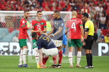 2022-12-14 - Hakim Ziyech of Morocco, Selim Amallah of Morocco, Olivier Giroud of France, Kylian Mbappe of France, Sofyan Amrabat of Morocco and Referee Cesar Arturo Ramos Palazuelos during the FIFA World Cup 2022, Semi-final football match between France and Morocco on December 14, 2022 at Al Bayt Stadium in Al Khor, Qatar - FOOTBALL - WORLD CUP 2022 - 1/2 - FRANCE V MOROCCO - FIFA WORLD CUP - SOCCER