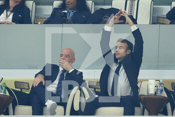 2022-12-14 - President of France Emmanuel Macron (R) and President of FIFA Gianni Infantino attend the FIFA World Cup 2022, Semi-final football match between France and Morocco on December 14, 2022 at Al Bayt Stadium in Al Khor, Qatar - FOOTBALL - WORLD CUP 2022 - 1/2 - FRANCE V MOROCCO - FIFA WORLD CUP - SOCCER