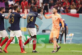 2022-12-14 - France goalkeeper Hugo Lloris celebrates with team mates during the FIFA World Cup 2022, Semi-final football match between France and Morocco on December 14, 2022 at Al Bayt Stadium in Al Khor, Qatar - FOOTBALL - WORLD CUP 2022 - 1/2 - FRANCE V MOROCCO - FIFA WORLD CUP - SOCCER