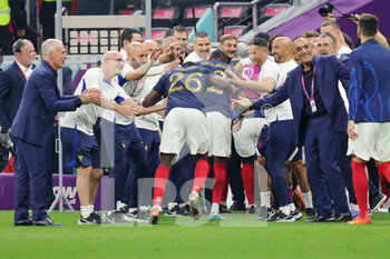 2022-12-14 - Staff of France celebrate Marcus Thuram and Randal Kolo Muani at full time during the FIFA World Cup 2022, Semi-final football match between France and Morocco on December 14, 2022 at Al Bayt Stadium in Al Khor, Qatar - FOOTBALL - WORLD CUP 2022 - 1/2 - FRANCE V MOROCCO - FIFA WORLD CUP - SOCCER