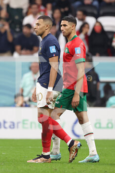 2022-12-14 - Kylian Mbappe of France, Achraf Hakimi of Morocco during the FIFA World Cup 2022, Semi-final football match between France and Morocco on December 14, 2022 at Al Bayt Stadium in Al Khor, Qatar - FOOTBALL - WORLD CUP 2022 - 1/2 - FRANCE V MOROCCO - FIFA WORLD CUP - SOCCER