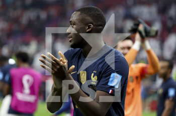 2022-12-14 - Ibrahima Konate of France celebrates the victory following the FIFA World Cup 2022, Semi-final football match between France and Morocco on December 14, 2022 at Al Bayt Stadium in Al Khor, Qatar - FOOTBALL - WORLD CUP 2022 - 1/2 - FRANCE V MOROCCO - FIFA WORLD CUP - SOCCER