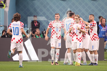 2022-12-17 - Josko Gvardiol of Croatia celebrates after scoring his side's first goal with team mates during the FIFA World Cup 2022, third place football match between Croatia and Morocco on December 17, 2022 at Khalifa International Stadium in Ar-Rayyan, Qatar - FOOTBALL - WORLD CUP 2022 - 3RD PLACE - CROATIA V MOROCCO - FIFA WORLD CUP - SOCCER