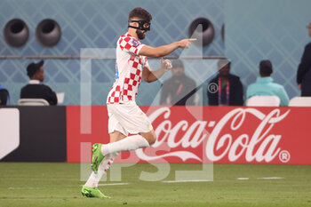 2022-12-17 - Josko Gvardiol of Croatia celebrates after scoring his side's first goal during the FIFA World Cup 2022, third place football match between Croatia and Morocco on December 17, 2022 at Khalifa International Stadium in Ar-Rayyan, Qatar - FOOTBALL - WORLD CUP 2022 - 3RD PLACE - CROATIA V MOROCCO - FIFA WORLD CUP - SOCCER