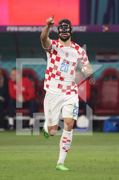 2022-12-17 - Josko Gvardiol of Croatia celebrates after scoring his side's first goal during the FIFA World Cup 2022, third place football match between Croatia and Morocco on December 17, 2022 at Khalifa International Stadium in Ar-Rayyan, Qatar - FOOTBALL - WORLD CUP 2022 - 3RD PLACE - CROATIA V MOROCCO - FIFA WORLD CUP - SOCCER