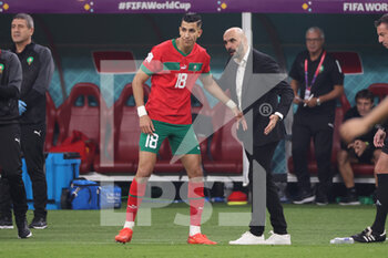 2022-12-17 - Jawad El Yamiq of Morocco, Coach of Morocco Walid Regragui during the FIFA World Cup 2022, third place football match between Croatia and Morocco on December 17, 2022 at Khalifa International Stadium in Ar-Rayyan, Qatar - FOOTBALL - WORLD CUP 2022 - 3RD PLACE - CROATIA V MOROCCO - FIFA WORLD CUP - SOCCER