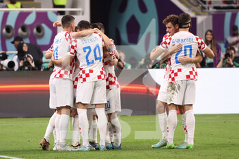2022-12-17 - Mislav Orsic of Croatia celebrate with team mates after scoring during the FIFA World Cup 2022, third place football match between Croatia and Morocco on December 17, 2022 at Khalifa International Stadium in Ar-Rayyan, Qatar - FOOTBALL - WORLD CUP 2022 - 3RD PLACE - CROATIA V MOROCCO - FIFA WORLD CUP - SOCCER
