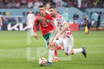 2022-12-17 - Mateo Kovacic of Croatia, Bilal El Khannouss of Morocco (L) during the FIFA World Cup 2022, third place football match between Croatia and Morocco on December 17, 2022 at Khalifa International Stadium in Ar-Rayyan, Qatar - FOOTBALL - WORLD CUP 2022 - 3RD PLACE - CROATIA V MOROCCO - FIFA WORLD CUP - SOCCER