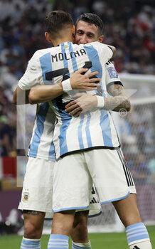 2022-12-18 - Angel Di Maria of Argentina celebrates his goal with Nahuel Molina during the FIFA World Cup 2022, Final football match between Argentina and France on December 18, 2022 at Lusail Stadium in Al Daayen, Qatar - FOOTBALL - WORLD CUP 2022 - FINAL - ARGENTINA V FRANCE - FIFA WORLD CUP - SOCCER