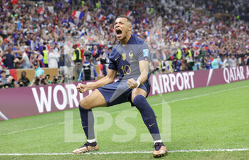 2022-12-18 - Kylian Mbappe of France celebrates his goal 2-2 during the FIFA World Cup 2022, Final football match between Argentina and France on December 18, 2022 at Lusail Stadium in Al Daayen, Qatar - FOOTBALL - WORLD CUP 2022 - FINAL - ARGENTINA V FRANCE - FIFA WORLD CUP - SOCCER