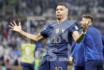 2022-12-18 - Kylian Mbappe of France celebrates his goal 2-2 during the FIFA World Cup 2022, Final football match between Argentina and France on December 18, 2022 at Lusail Stadium in Al Daayen, Qatar - FOOTBALL - WORLD CUP 2022 - FINAL - ARGENTINA V FRANCE - FIFA WORLD CUP - SOCCER