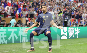 2022-12-18 - Kylian Mbappe of France celebrates his goal 3-3 during the FIFA World Cup 2022, Final football match between Argentina and France on December 18, 2022 at Lusail Stadium in Al Daayen, Qatar - FOOTBALL - WORLD CUP 2022 - FINAL - ARGENTINA V FRANCE - FIFA WORLD CUP - SOCCER