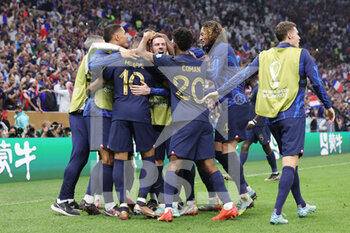 2022-12-18 - Kylian Mbappe of France celebrates his goal 3-3 with teammates during the FIFA World Cup 2022, Final football match between Argentina and France on December 18, 2022 at Lusail Stadium in Al Daayen, Qatar - FOOTBALL - WORLD CUP 2022 - FINAL - ARGENTINA V FRANCE - FIFA WORLD CUP - SOCCER