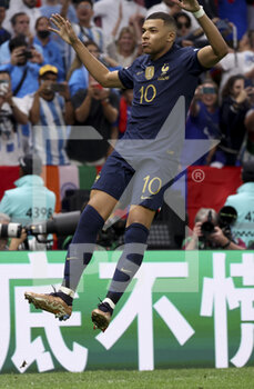 2022-12-18 - Kylian Mbappe of France celebrates his third goal during the FIFA World Cup 2022, Final football match between Argentina and France on December 18, 2022 at Lusail Stadium in Al Daayen, Qatar - FOOTBALL - WORLD CUP 2022 - FINAL - ARGENTINA V FRANCE - FIFA WORLD CUP - SOCCER
